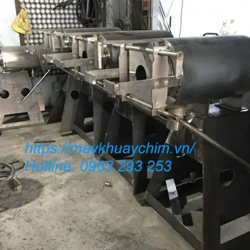 may-ep-phan-heo-gia-cong-au-lac